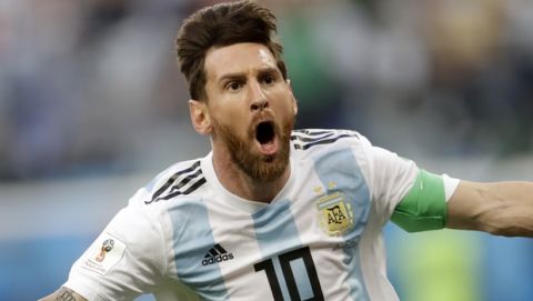 Argentina's Lionel Messi celebrates after scoring the opening goal of his team during the group D match between Argentina and Nigeria, at the 2018 soccer World Cup in the St. Petersburg Stadium in St. Petersburg, Russia, Tuesday, June 26, 2018. (AP Photo/Petr David Josek)