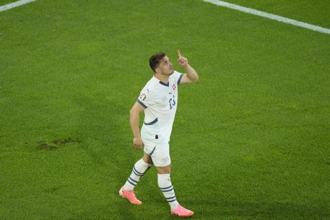 Switzerland's Xherdan Shaqiri celebrates after scoring his side's opening goal during a Group A match between Scotland and Switzerland at the Euro 2024 soccer tournament in Cologne, Germany, Wednesday, June 19, 2024. (AP Photo/Andreea Alexandru)