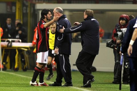 AC Milan's midfielder Gennaro Ivan Gattuso argues with Tottenham Hotspurs' assistant coach Joe Jordan during their Champions League match between AC Milan against Tottenham on February 15, 2011 in San Siro Stadium in Milan. AFP PHOTO / OLIVIER MORIN (Photo credit should read OLIVIER MORIN/AFP/Getty Images)