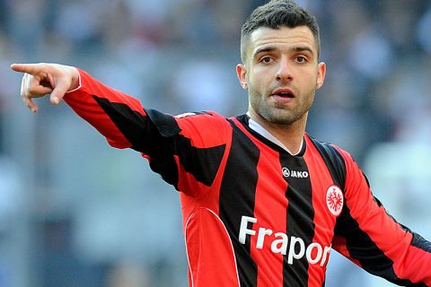 FRANKFURT AM MAIN, GERMANY - MARCH 19: Georgios Tzavellas of Frankfurt gestures during the Bundesliga match between Eintracht Frankfurt and 1.FC St. Pauli at Commerzbank Arena on March 19, 2011 in Frankfurt am Main, Germany.  (Photo by Thorsten Wagner/Bongarts/Getty Images)