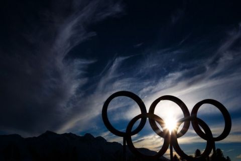 Feb 13, 2014; Krasnaya Polyana, RUSSIA;  A view of the Olympic rings as the sun sets at the Laura Cross Country Ski and Biathlon Center during the Sochi 2014 Olympic Winter Games at.  Mandatory Credit: Guy Rhodes-USA TODAY Sports