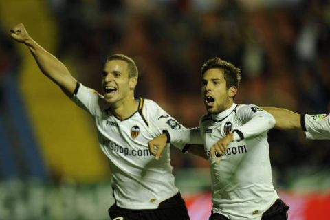 Valencia's forward Roberto Soldado (L) and midfielder Jordi Alba (R) celebrate after scoring against Levante on November 5, 2011 during a Spanish league football match at the Ciudad de Valencia stadium in Valencia.    AFP PHOTO/ PEDRO ARMESTRE (Photo credit should read PEDRO ARMESTRE/AFP/Getty Images)