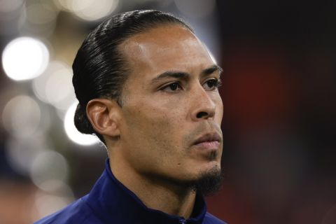 Netherlands' Virgil van Dijk during the line-up prior to the international friendly soccer match between Netherlands and Scotland at the Johan Cruyff ArenA, in Amsterdam, Netherlands, Friday, March 22, 2024. (AP Photo/Peter Dejong)