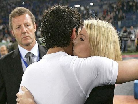 AC Milan's board member Barbara Berlusconi, daughter of Italian Premier Silvio Berlusconi, kisses AC Milan Brazilian forward Pato at the end of a  Serie A soccer match between AS Roma and AC Milan at Rome's Olympic stadium, Saturday, May 7, 2011. AC Milan ended five years of dominance by city rival Inter Milan and clinched the Serie A title on Saturday following a heated 0-0 draw at Roma. AC Milan leads Inter by nine points and is 10 in front of Napoli. While Inter could still mathematically finish even on points, Milan holds the tiebreaker courtesy of its two derby wins. (AP Photo/Riccardo De Luca)