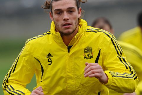 Liverpool's English forward Andy Carroll trains at the club's Melwood ground in Liverpool, north-west England, on March 16, 2011, ahead of their UEFA Europa League football match against Potuguese team Braga on March 17, in Liverpool. AFP PHOTO/PAUL ELLIS (Photo credit should read PAUL ELLIS/AFP/Getty Images)