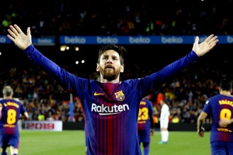 Barcelona's Lionel Messi celebrates scoring his side's second goal during a Spanish La Liga soccer match between Barcelona and Real Madrid, dubbed 'El Clasico', at the Camp Nou stadium in Barcelona, Spain, Sunday, May 6, 2018. (AP Photo/Emilio Morenatti)