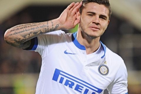 MAU317. Florence (Italy), 15/02/2014.- Argentinian forward of Inter, Mauro Icardi, jubilates after scoring the goal during the Italian Serie A soccer match ACF Fiorentina vs Inter Milan at Artemio Franchi stadium in Florence, Italy, 15 February 2014. EFE/EPA/MAURIZIO DEGL'INNOCENTI