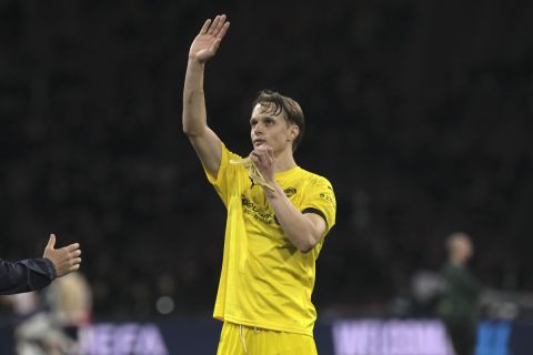 Glimt's Ulrik Saltnes waves to spectators after the Europa Conference League knockout round play-off first leg soccer match between Ajax and Bodo Glimt in Amsterdam, the Netherlands, Thursday, Feb. 15, 2024. The match ended in a 2-2 draw. (AP Photo/Patrick Post)