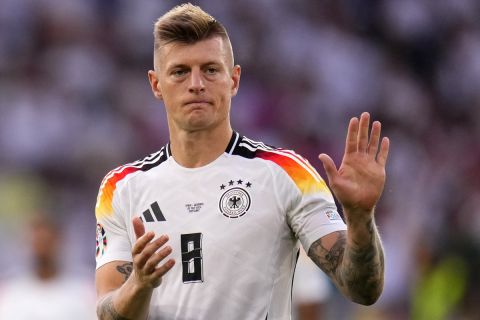 Germany's Toni Kroos walks off the pitch after a quarter final match between Germany and Spain at the Euro 2024 soccer tournament in Stuttgart, Germany, Friday, July 5, 2024. (AP Photo/Manu Fernandez)