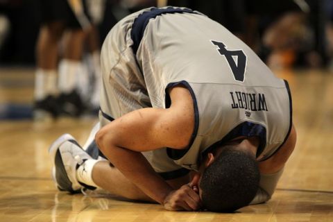 CHICAGO, IL - MARCH 18:  Chris Wright #4 of the Georgetown Hoyas reacts after losing to the Virginia Commonwealth Rams during the second round of the 2011 NCAA men's basketball tournament at the United Center on March 18, 2011 in Chicago, Illinois. Virginia Commonwealth won 74-56 in regulation.  (Photo by Jamie Squire/Getty Images)