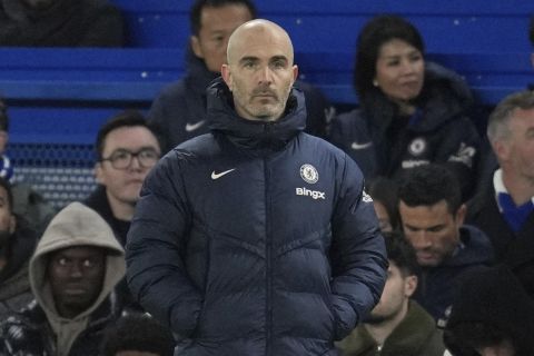 Chelsea's head coach Enzo Maresca watches his team play from the sidelines during the English Premier League soccer match between Chelsea and Brentford at Stamford Bridge in London, Sunday, Dec. 15, 2024. (AP Photo/Kin Cheung)