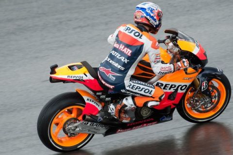 HOHENSTEIN-ERNSTTHAL, GERMANY - JULY 06:   Casey Stoner of Australia and Repsol Honda Team heads down a straight during the free practice of the MotoGp of Germany at Sachsenring Circuit on July 6, 2012 in Hohenstein-Ernstthal, Germany.  (Photo by Mirco Lazzari gp/Getty Images)