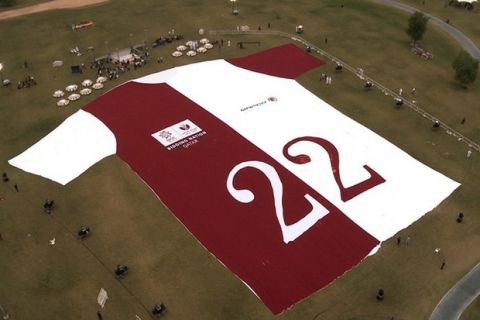 A handout picture from the media office of the Qatar 2022 bid shows an aerial picture of the largest jersey in the world in Doha on November 24, 2010 that was created by Qatar Petrochemical company (QAPCO) in support of Qatar's bid to host the FIFA World Cup in 2022. AFP PHOTO/HO/QATAR 2022 BID MEDIA OFFICE  == RESTRICTED TO EDITORIAL USE == (Photo credit should read -/AFP/Getty Images)