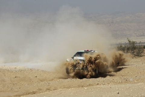 AMMAN, JORDAN - APRIL 16:  Matthew Wilson and Scott Martin of Great Britain compete in their M-Sport Stobart Ford WRT Ford Fiesta RS WRC during Day2 of the WRC Rally Jordan on April 16, 2011 in Amman, Jordan.  (Photo by Massimo Bettiol/Getty Images)