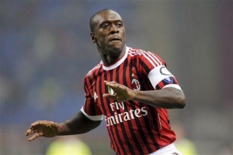 AC Milan's Clarence Seedorf, of The Netherlands, celebrates after scoring against Cesena during a Serie A soccer match in Milan, Italy, Saturday, Sept. 24, 2011. (AP Photo/Fabio Ferrari, LaPresse) ITALY OUT