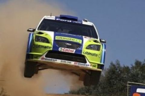 In this photo released by Rally Australia, Finland's Mikko Hirvonen in a Ford gets airborne during the first stage of the Rally Australia in Pottsville, outback New South Wales, Australia, Thursday, Sept. 3, 2009. Hirvonen leads the World Rally Championship with 68 points ahead of France's Sebastien Loeb, and Spaniard Dani Sordo. (AP Photo/Rally Australia, Jeremy Rogers) ** NO SALES, EDITORIAL USE ONLY **