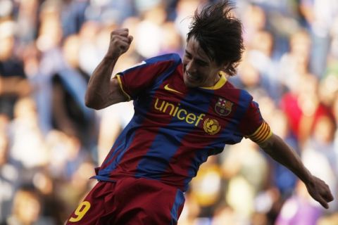 Barcelona's Bojan Krkic celebrates after scoring a penalty against Malaga during their Spanish First Division soccer match at La Rosaleda stadium in Malaga May 21, 2011. REUTERS/Jon Nazca (SPAIN - Tags: SPORT SOCCER)