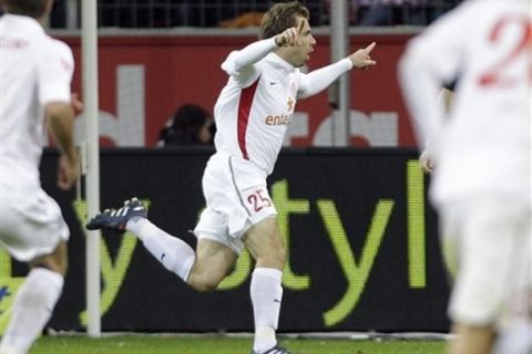 Mainz's Andreas Ivanschitz of Austria celebrates after scoring during the German first division Bundesliga soccer match between Bayer 04 Leverkusen and FSV Mainz 05 in Leverkusen, Germany, Sunday, Oct. 24, 2010. (AP Photo/Frank Augstein) ** NO MOBILE USE UNTIL 2 HOURS AFTER THE MATCH, WEBSITE USERS ARE OBLIGED TO COMPLY WITH DFL-RESTRICTIONS, SEE INSTRUCTIONS FOR DETAILS **