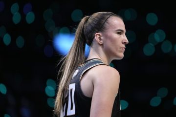 New York Liberty's Sabrina Ionescu stands on the court during the first half in Game 1 of a WNBA basketball final playoff series against the Minnesota Lynx, Thursday, Oct. 10, 2024, in New York. (AP Photo/Pamela Smith)