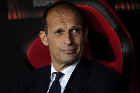 FILE - Juventus' head coach Massimiliano Allegri looks on before their Europa League soccer match against Sevilla, at the Ramon Sanchez Pizjuan stadium in Seville, Spain, Thursday, May 18, 2023. Inter Milan host Juventus on Sunday, Feb. 4, 2024. Inter coach Simone Inzaghi has won three Italian Cup titles and lifted the Italian Super Cup five times. He has never won a league title but appears to be closer than ever to it this season. Standing in his way is one of the most successful coaches in Italy in Massimiliano Allegri. (AP Photo/Jose Breton, file)