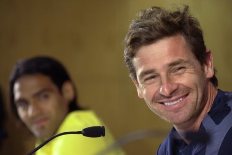 FC Portos coach Andre Villas Boas (R) smiles next to Colombian forward Radamel Falcao during a press conference after their training session at the Dragao Stadium in Porto on April 6, 2011, on the eve of their UEFA Europa League quarter finals 1st leg football match against Spartak. AFP PHOTO / MIGUEL RIOPA (Photo credit should read MIGUEL RIOPA/AFP/Getty Images)