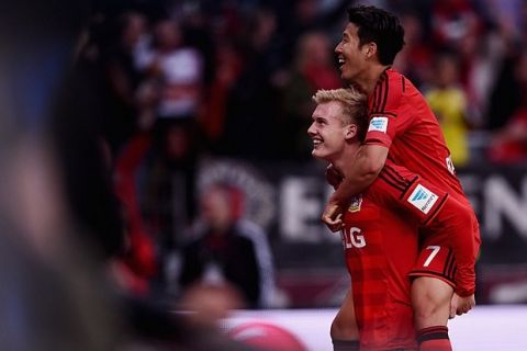 LEVERKUSEN, GERMANY - MAY 02:  Julian Brandt of Bayer Leverkusen celebrates as he scores the second goal during the Bundesliga match between Bayer 04 Leverkusen and FC Bayern Muenchen at BayArena on May 2, 2015 in Leverkusen, Germany.  (Photo by Dennis Grombkowski/Bongarts/Getty Images)