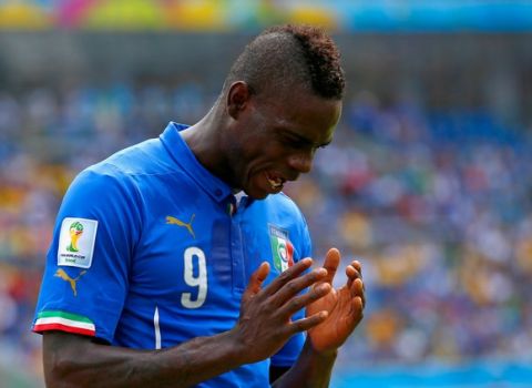 NATAL, BRAZIL - JUNE 24:  Mario Balotelli of Italy reacts during the 2014 FIFA World Cup Brazil Group D match between Italy and Uruguay at Estadio das Dunas on June 24, 2014 in Natal, Brazil.  (Photo by Clive Rose/Getty Images)