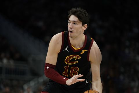 Cleveland Cavaliers' Cedi Osman during the first half of an NBA basketball game against the Milwaukee Bucks Saturday, Dec. 18, 2021, in Milwaukee. (AP Photo/Morry Gash)