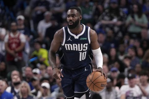 Dallas Mavericks' Tim Hardaway Jr. advances the ball against the Oklahoma City Thunder in Game 4 of an NBA basketball second-round playoff series Monday, May 13, 2024, in Dallas. (AP Photo/Tony Gutierrez)