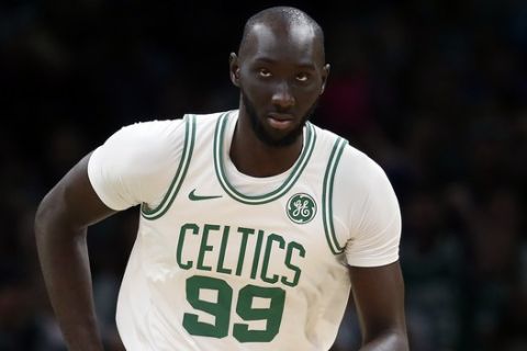 Boston Celtics' Tacko Fall plays against the Cleveland Cavaliers during the second half of an NBA preseason basketball game in Boston, Sunday, Oct. 13, 2019. (AP Photo/Michael Dwyer)