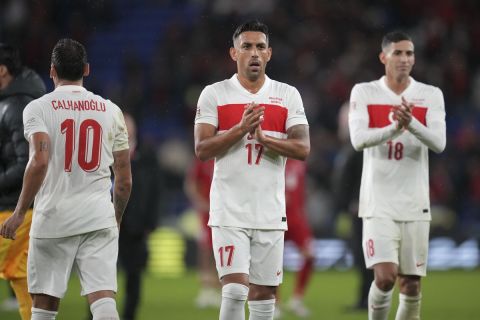 Turkey players acknowledge supporters at the end of the UEFA Nations League soccer match between Wales and Turkey, at the Cardiff City Stadium, Wales, Friday, Sept. 6, 2024. (AP Photo/Kin Cheung)