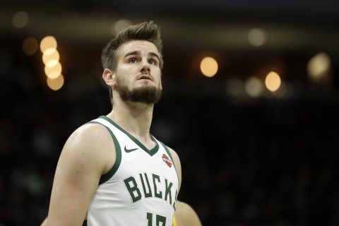 Milwaukee Bucks' Dragan Bender during the first half of a preseason NBA basketball game against the Utah Jazz Wednesday, Oct. 9, 2019, in Milwaukee. (AP Photo/Aaron Gash)