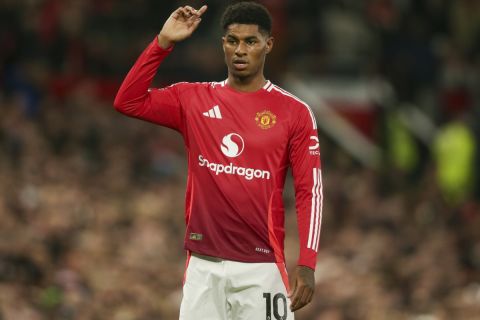 Manchester United's Marcus Rashford gestures during the Premier League soccer match between Manchester United and Chelsea at Old Trafford stadium in Manchester, England, Sunday, Nov. 3, 2024. (AP Photo/Ian Hodgson)