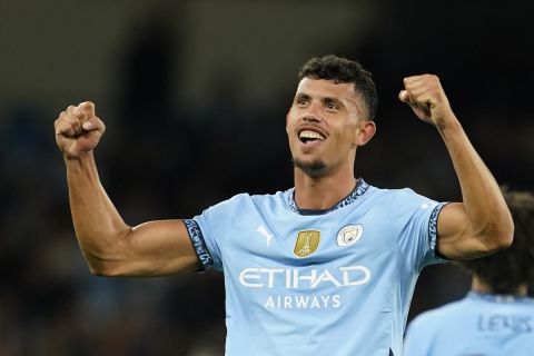 Manchester City's Matheus Nunes celebrates after he scored during the English League Cup soccer match between Manchester City and Watford in Manchester, England, Tuesday, Sept. 24, 2024. (AP Photo/Dave Thompson)