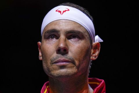 Spain's tennis player Rafael Nadal during the national anthem ahead of a Davis Cup quarterfinal match against Netherlands' Botic Van De Zandschulp at Martin Carpena Sports Hall in Malaga, southern Spain, on Tuesday, Nov. 19, 2024. (AP Photo/Manu Fernandez)