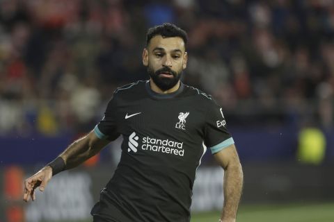 Liverpool's Mohamed Salah during the Champions League soccer match between Girona and Liverpool at the Estadi Montilivi in Girona, Spain, Tuesday, Dec. 10, 2024. (AP Photo/Joan Monfort)