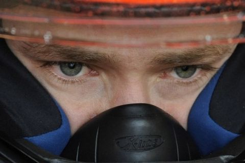 Repsol Honda MotoGP rider Casey Stoner of Australia prepares to leave the pits during warm up for the British motorcycling Grand Prix at the Silverstone circuit, central England, June 12, 2011. REUTERS/Nigel Roddis (BRITAIN - Tags: SPORT MOTOR RACING)