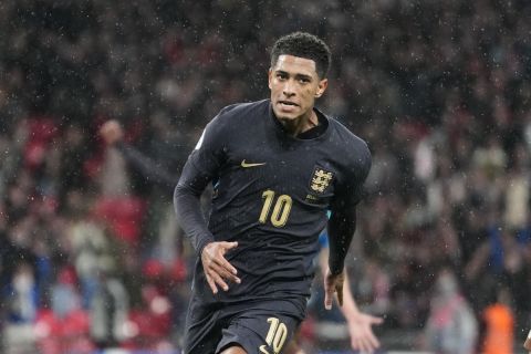 England's Jude Bellingham celebrates after scoring his side's second goal during an international friendly soccer match between England and Belgium at Wembley Stadium, in London, Tuesday, March 26, 2024. (AP Photo/Kirsty Wigglesworth)