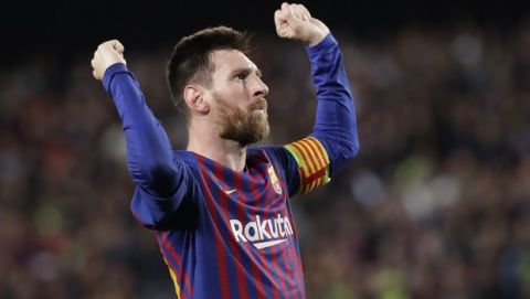 Barcelona's Lionel Messi celebrates after scoring his side's third goal during the Champions League semifinal, first leg, soccer match between FC Barcelona and Liverpool at the Camp Nou stadium in Barcelona, Spain, Wednesday, May 1, 2019. (AP Photo/Emilio Morenatti)