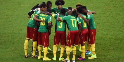 MANAUS, BRAZIL - JUNE 18: Cameroon huddle during the 2014 FIFA World Cup Brazil Group A match between Cameroon and Croatia at Arena Amazonia on June 18, 2014 in Manaus, Brazil.  (Photo by Stu Forster/Getty Images)