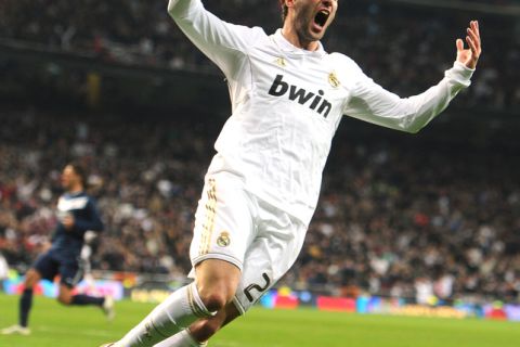 Real Madrid's Argentinian forward Gonzalo Higuain celebrates after scoring during the Spanish Cup football match Real Madrid vs Malaga on January 3, 2012 at the Santiago Bernabeu stadium in Madrid. AFP PHOTO/DOMINIQUE FAGET (Photo credit should read DOMINIQUE FAGET/AFP/Getty Images)