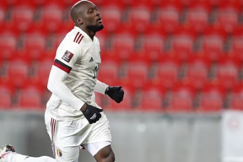 Belgium's Romelu Lukaku celebrates after scoring his side's first goal during the World Cup 2022 group E qualifying soccer match between Czech Republic and Belgium at the Sinobo stadium in Prague, Czech Republic, Saturday, March 27, 2021. (AP Photo/Petr David Josek)