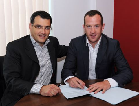 John Powell Picture  6/7/11
Charlie Adam signs his contract with Director of Football Damian Comolli.