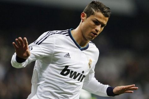 MADRID, SPAIN - APRIL 03:  Cristiano Ronaldo of Real Madrid celebrates after scoring the opening goal during the UEFA Champions League Quarter Final match between Real Madrid and Galatasaray at Estadio Santiago Bernabeu on April 3, 2013 in Madrid, Spain.  (Photo by Angel Martinez/Real Madrid via Getty Images)