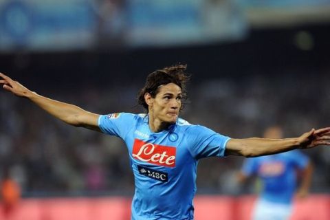 NAPLES, ITALY - SEPTEMBER 18:  Edinson Cavani of Napoli celebrates after scoring the equalising goal during the Serie A match between SSC Napoli and AC Milan at Stadio San Paolo on September 18, 2011 in Naples, Italy.  (Photo by Giuseppe Bellini/Getty Images)