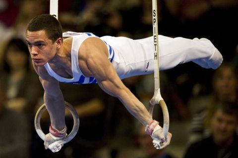 Greece's Eleftherios Petrounias performs to place third of the men's rings final of the 4th European Artistic Gymnastics Championships in Berlin April 9, 2011. AFP PHOTO / JOHN MACDOUGALL (Photo credit should read JOHN MACDOUGALL/AFP/Getty Images)