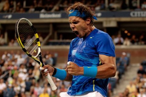 NEW YORK, NY - SEPTEMBER 10: Rafael Nadal of Spain reacts against Andy Murray of Great Britain  during Day Thirteen of the 2011 U.S. Open at the USTA Billie Jean King National Tennis Center on September 10, 2011 in the Flushing neighborhood of the Queens borough of New York City.  (Photo by Jared Wickerham/Getty Images for USTA)