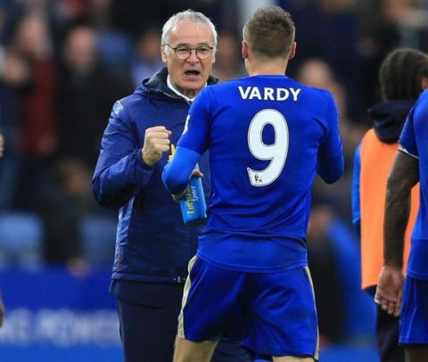 Leicester City manager Claudio Ranieri (left) celebrates with Jamie Vardy after the final whistle of the Barclays Premier League match at the King Power Stadium, Leicester. PRESS ASSOCIATION Photo. Picture date: Saturday October 24, 2015. See PA story SOCCER Leicester. Photo credit should read: Nigel French/PA Wire. RESTRICTIONS: EDITORIAL USE ONLY No use with unauthorised audio, video, data, fixture lists, club/league logos or "live" services. Online in-match use limited to 45 images, no video emulation. No use in betting, games or single club/league/player publications.