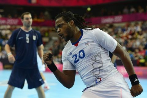 France's pivot Cedric Sorhaindo reacts after a goal during the men's preliminaries Group B handball match Argentina vs France for the London 2012 Olympics Games on July 31, 2012 at the Copper Box hall in London.     AFP PHOTO/ JAVIER SORIANO        (Photo credit should read JAVIER SORIANO/AFP/GettyImages)