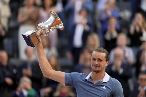 Alexander Zverev, of Germany, holds his trophy after defeating Nicolas Jarry, of Chile, in the Italian Open tennis tournament final match at Rome's Foro Italico, Sunday, May 19, 2024. Zverev won 6-4/7-5. (AP Photo/Alessandra Tarantino)